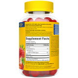 Nature Made Melatonin Gummies with a glass of water