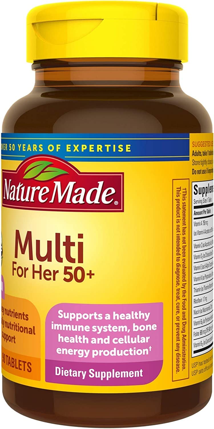 Nature Made Multi For Her 50 Plus tablets on a wooden surface