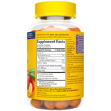 Nature Made Skin Hydration Gummies bottle on a wooden table