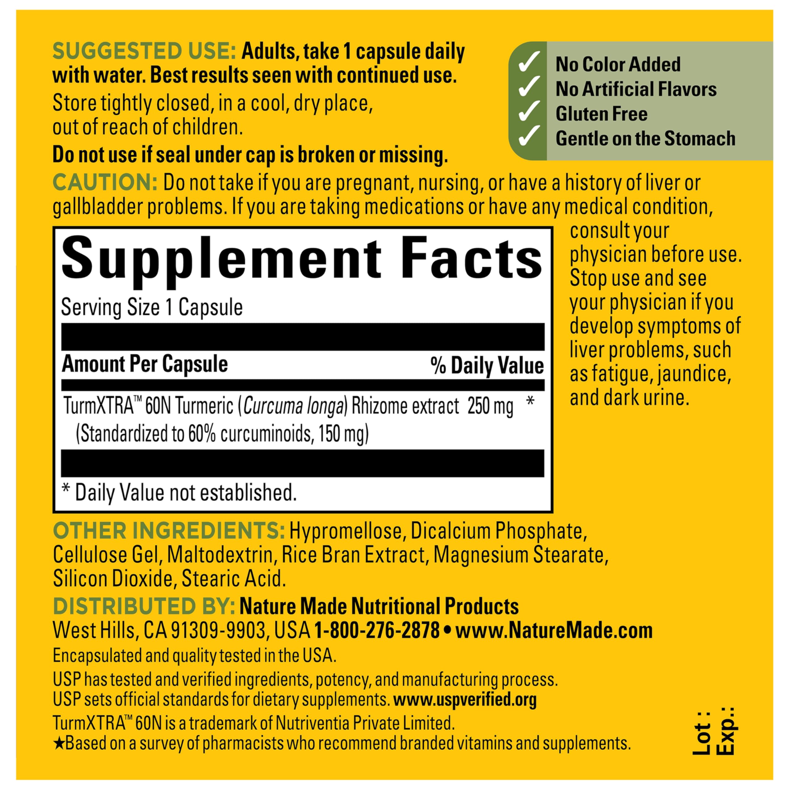Nature Made Turmeric Curcumin Capsules 250mg on a wooden table