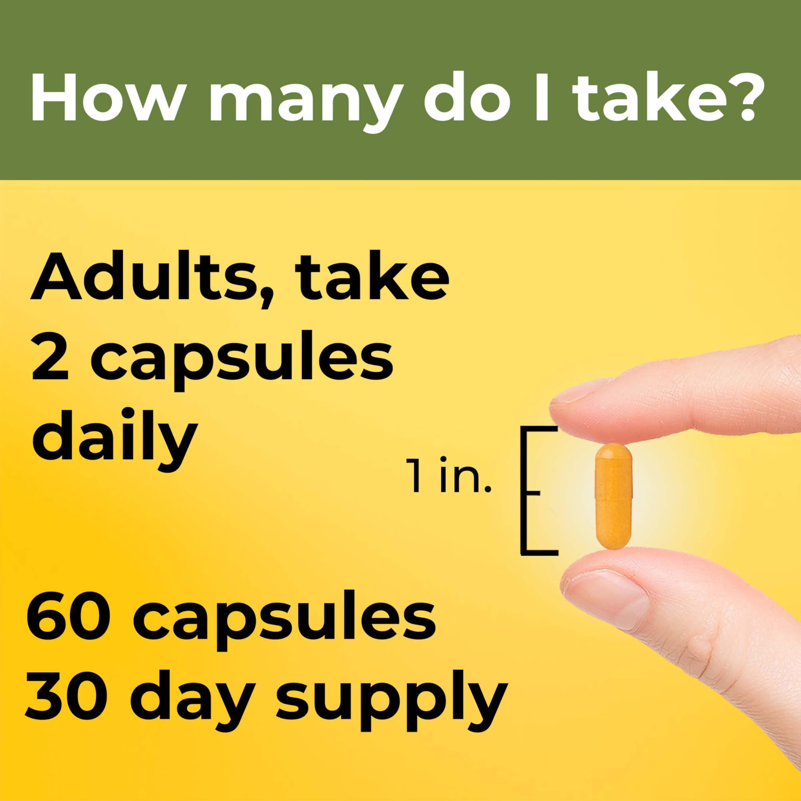 Nature Made Turmeric Extra Strength capsules on a wooden table