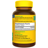 Nature Made Vitamin E 400 IU Softgels with a meal on a table