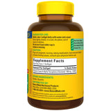 Nature Made Vitamin E 400 IU Softgels with a measuring spoon