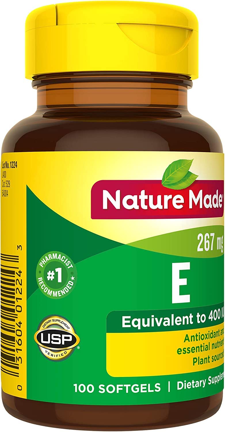 Nature Made Vitamin E Softgels with a glass of water