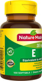 Nature Made Vitamin E Softgels with a glass of water
