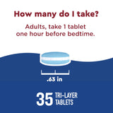 Nature Made Wellblends Sleep Longer tablets on a wooden surface