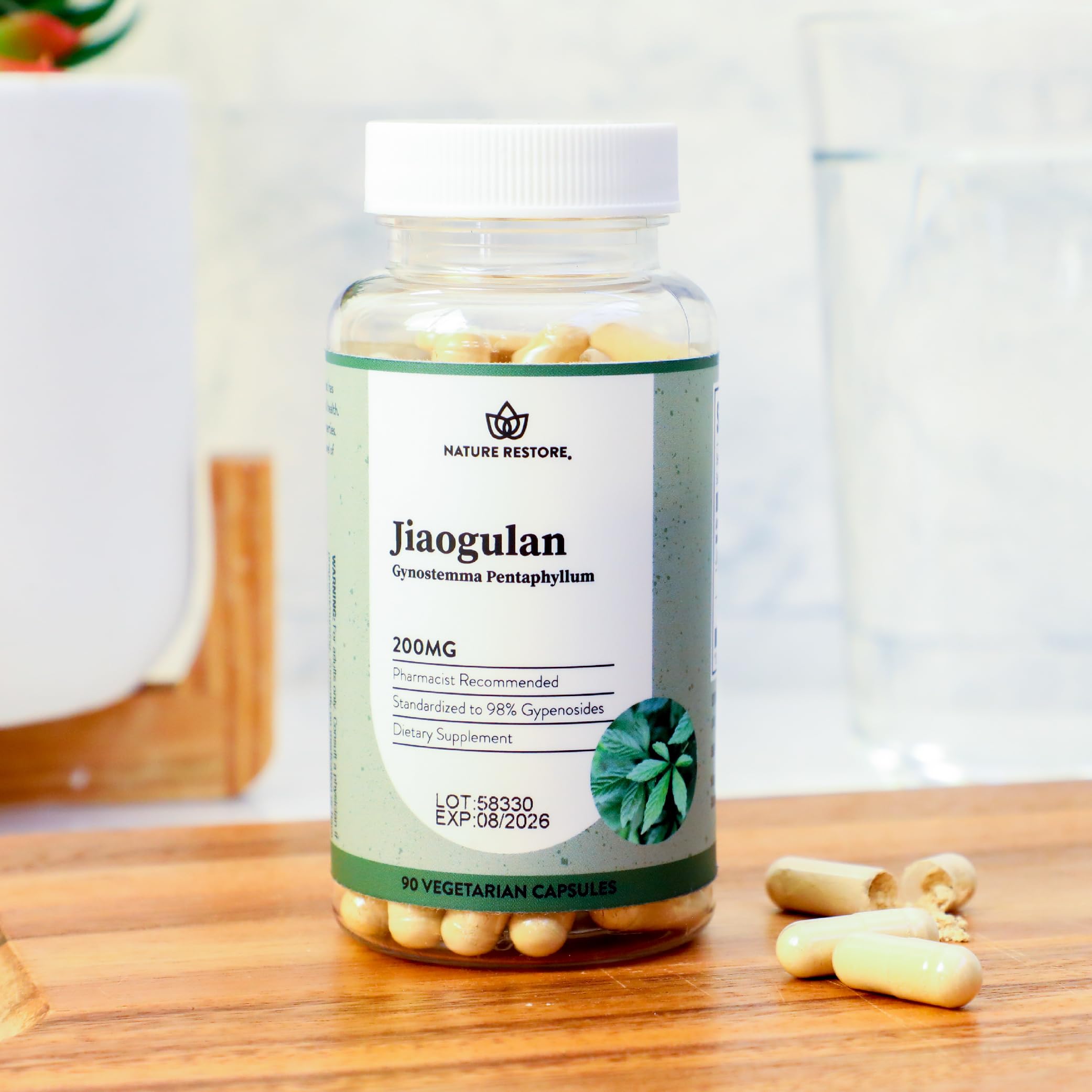 Nature Restore Gynostemma Pentaphyllum Capsules with a measuring spoon for dosage