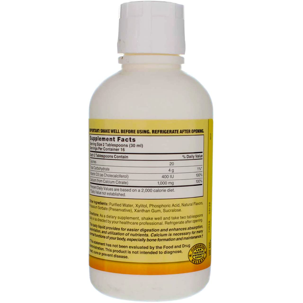 Nature's Blend Liquid Calcium Citrate bottle with measuring spoon
