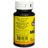 Nature's Blend Melatonin 5 mg Tablets on a wooden table