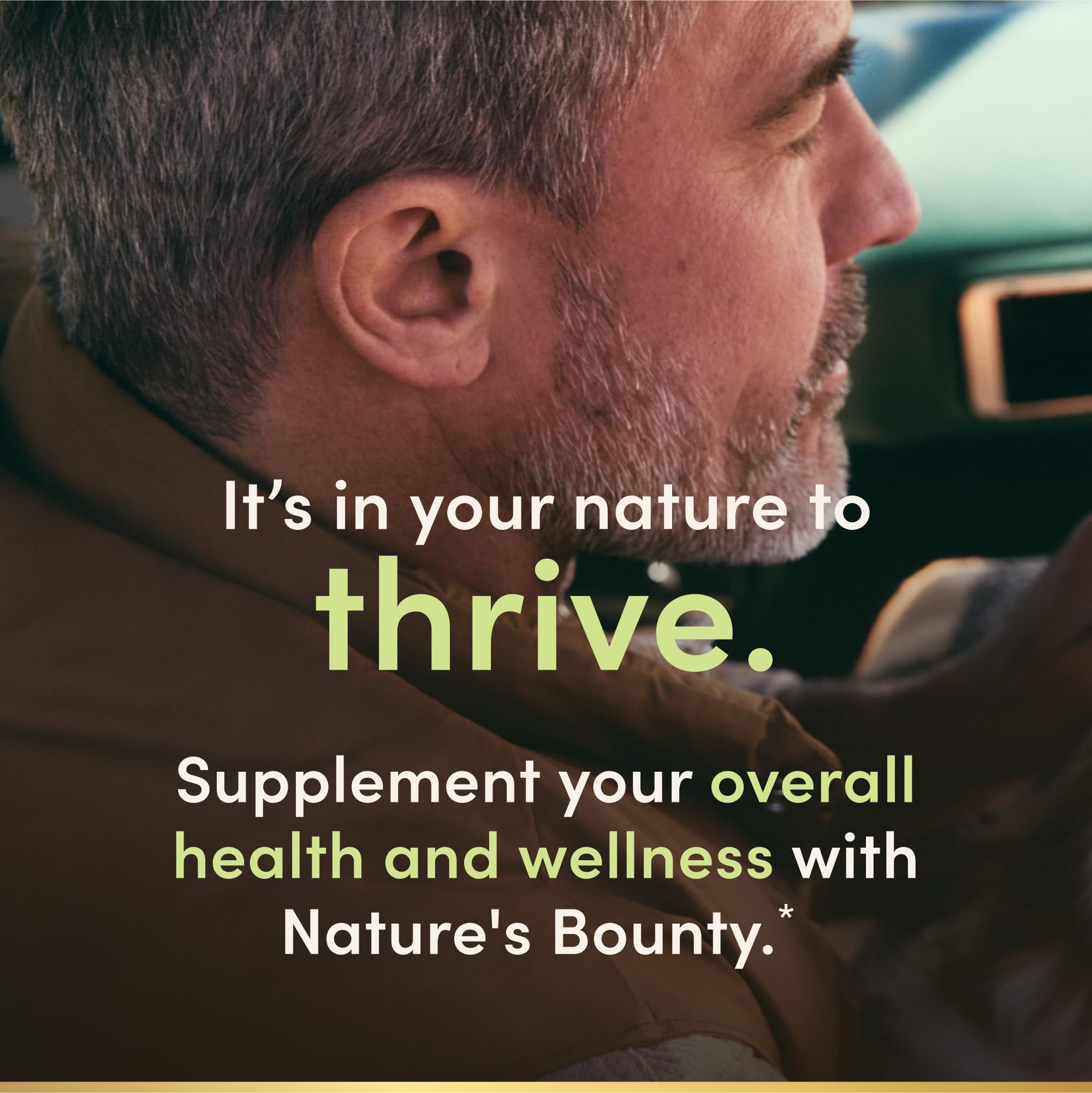 Nature's Bounty Activated Charcoal Capsules in hand