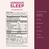 Nature's Bounty Gorgeous Sleep Gummies with a few gummies scattered