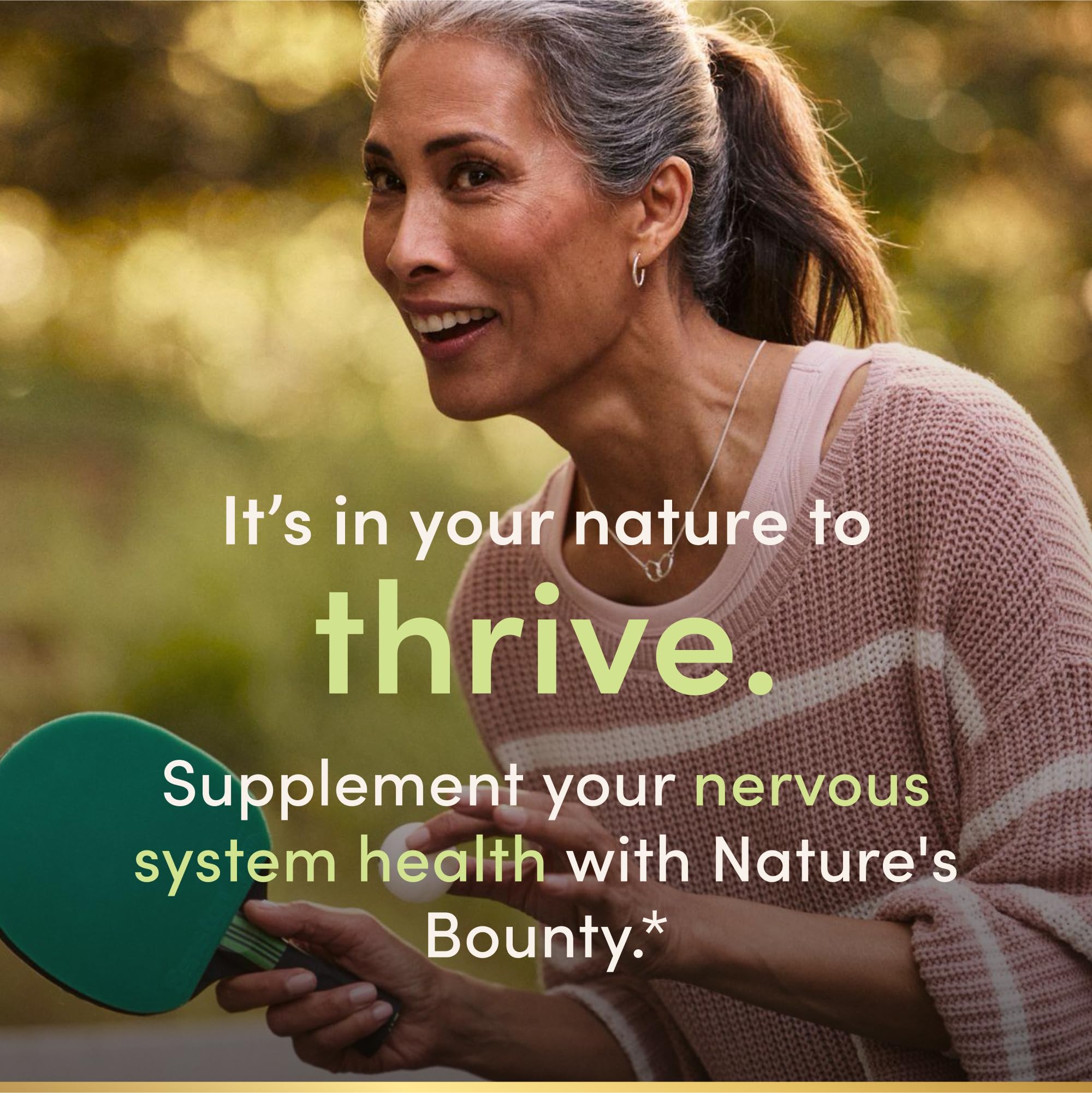 Nature's Bounty Niacin 500mg capsules with a measuring spoon