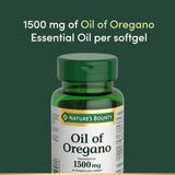 Nature's Bounty Oil of Oregano 1g supplement on a wooden table