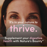 Nature's Bounty Probiotic Caplets on a wooden table
