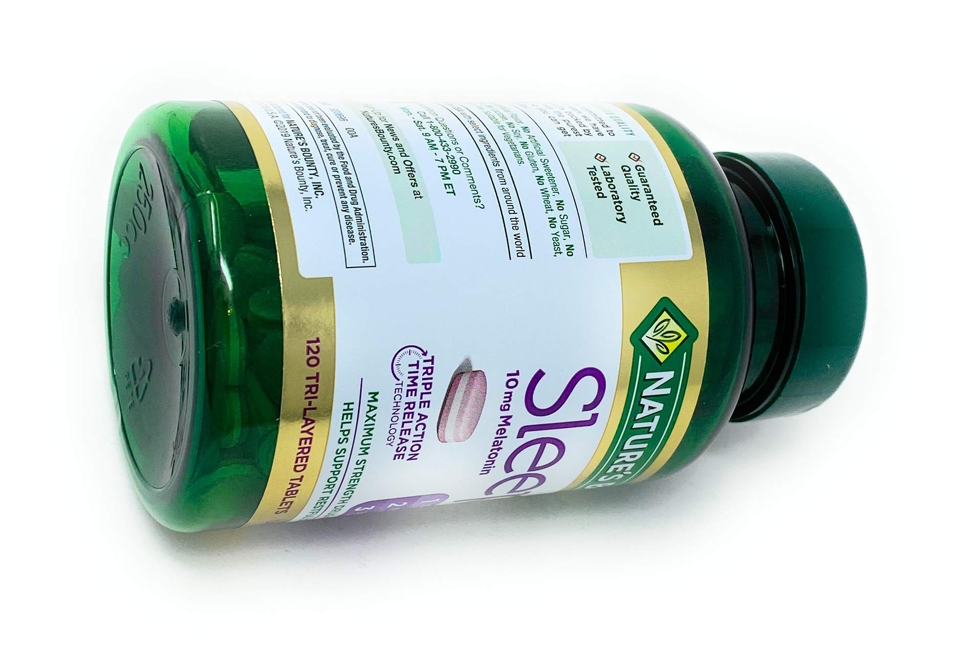Nature's Bounty Sleep 3 Triple Action Sleep Aid on a bedside table