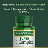 Nature's Bounty Super B-Complex tablets in a hand