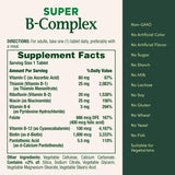 Nature's Bounty Super B-Complex tablets on a wooden surface