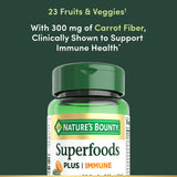 Nature's Bounty Superfoods Plus daily wellness capsule with a single capsule on a table