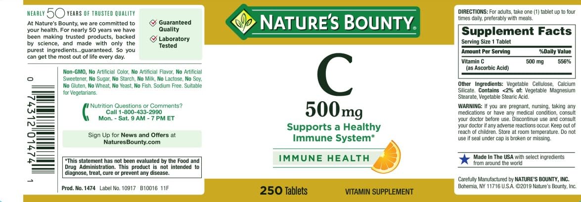 Nature's Bounty Vitamin C 500mg caplets on a wooden table