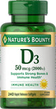 Nature's Bounty Vitamin D3 1000 IU supplement with measuring spoon