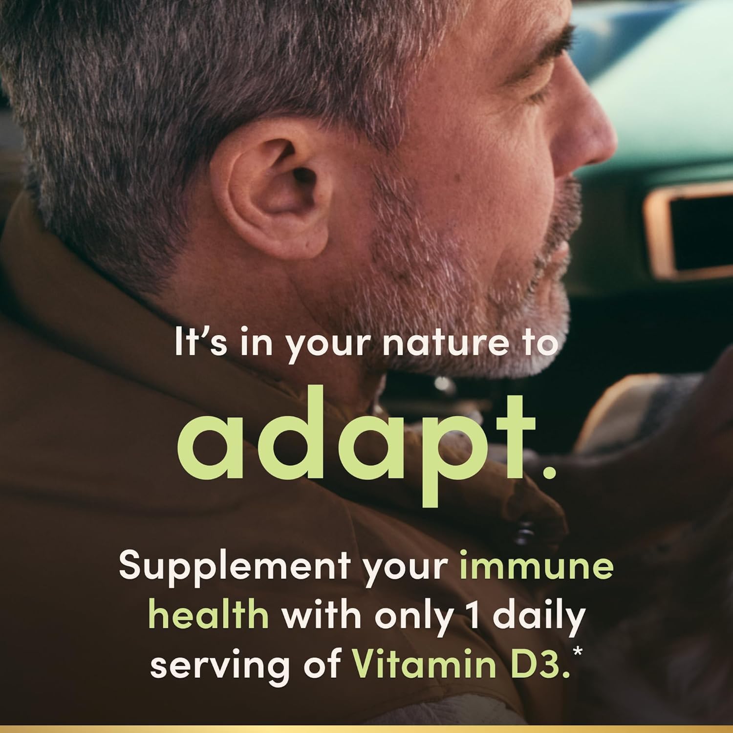 Nature's Bounty Vitamin D3 Rapid Release Softgels with a softgel in hand