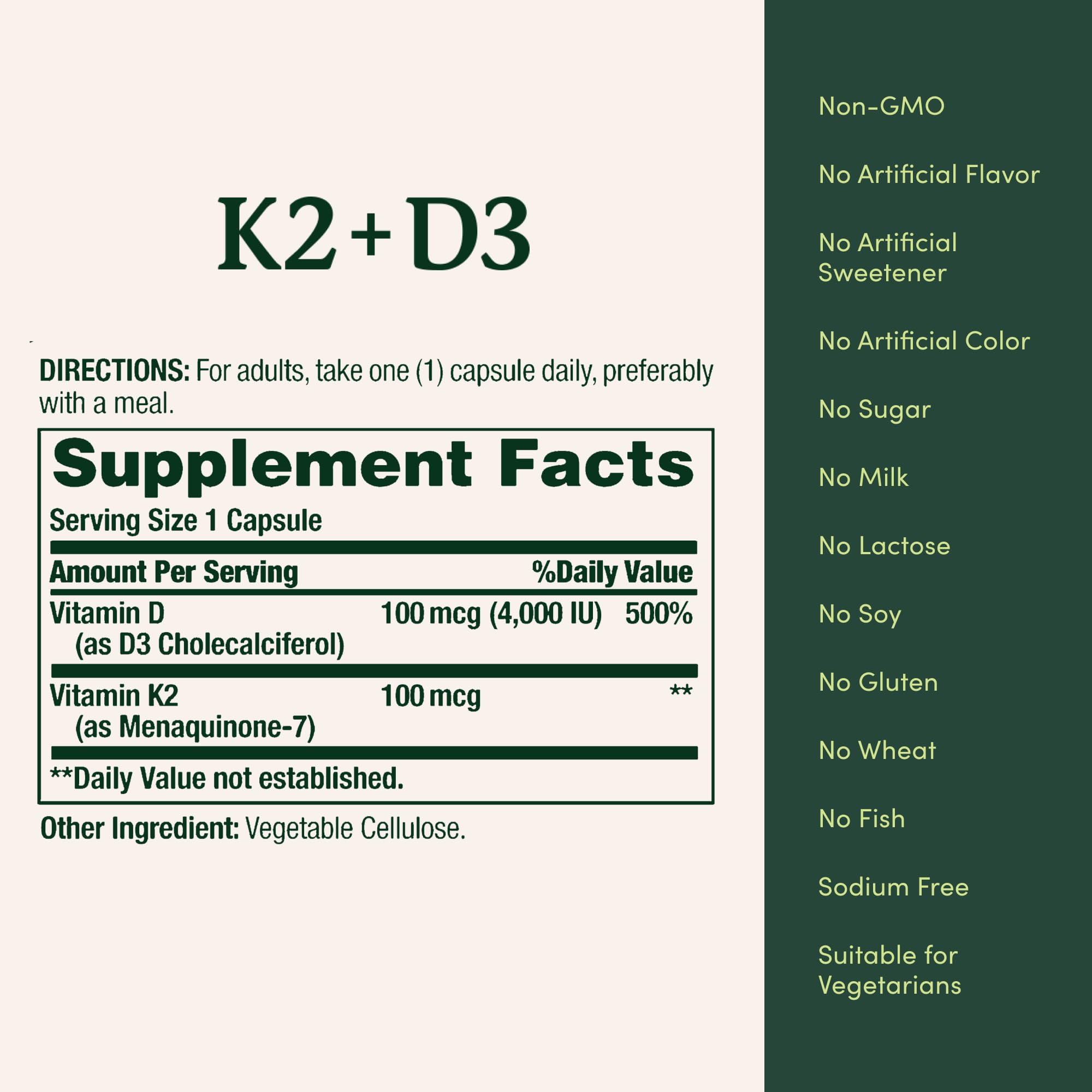 Nature's Bounty Vitamin K2 + D3 capsules on a wooden table
