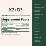 Nature's Bounty Vitamin K2 + D3 capsules on a wooden table