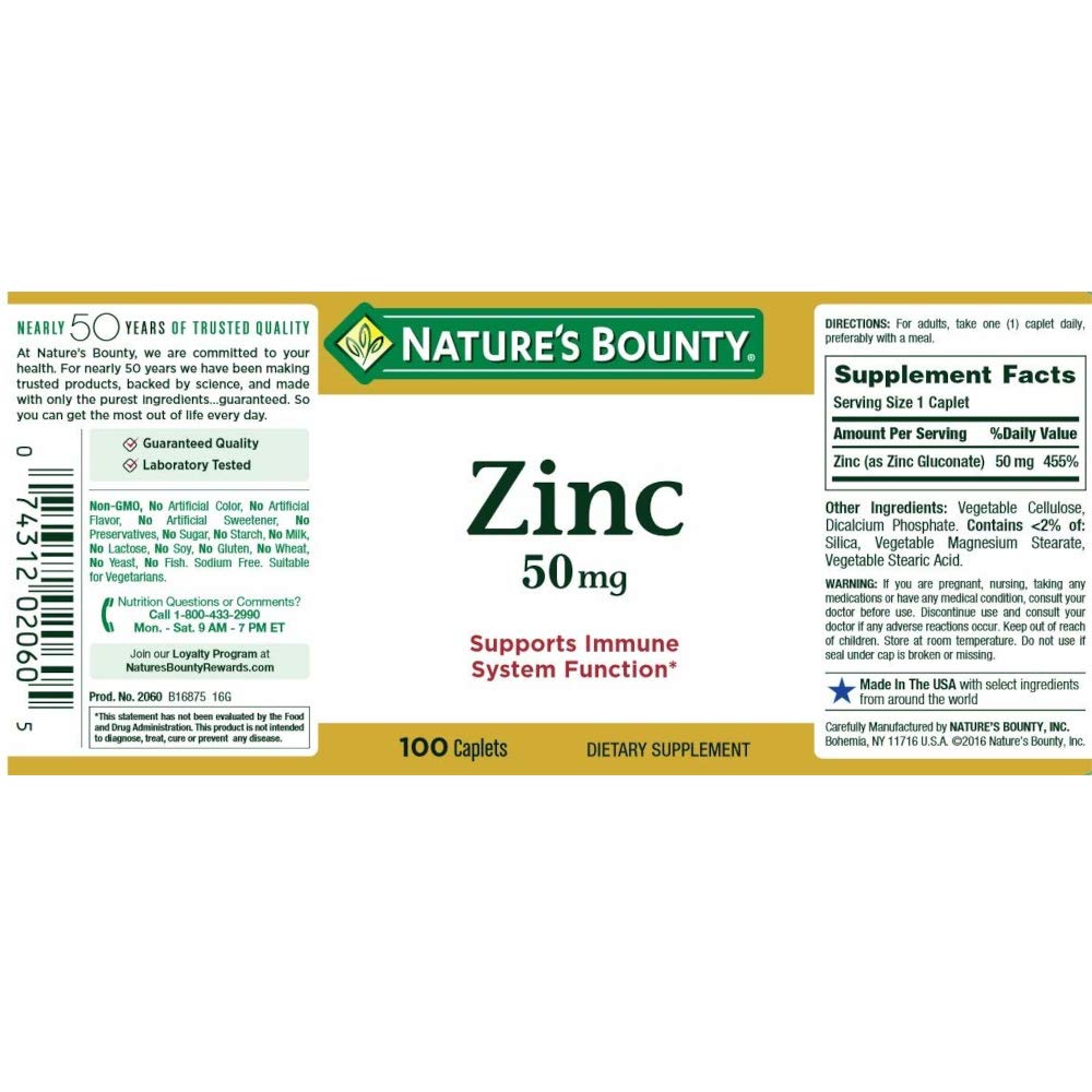 Nature's Bounty Zinc Caplets 50mg caplet in hand for size comparison