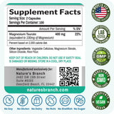 NATURE'S BRANCH Magnesium Taurate 400mg capsules on a wooden table