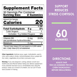Nature's Key Melatonin Gummies 5mg with a glass of water