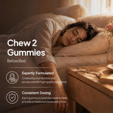 Nature's Key Melatonin Gummies with a glass of water