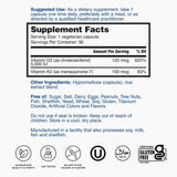 Nature's Lab Vitamin D3 Plus 5000 IU and K2 capsules on a wooden table