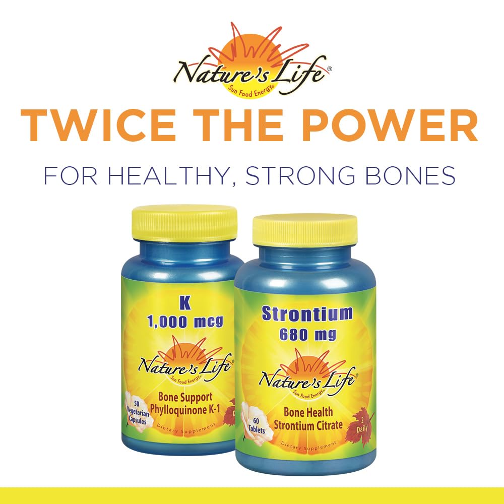 Nature's Life Vitamin K1 1000mcg vegetarian capsules on a wooden table