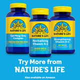 Nature's Life Vitamin K2 Menatetrenone MK4 5000 mcg supplement on a wooden table