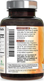 Nature's Nutrition Turmeric Curcumin & Ginger Supplement with a glass of water