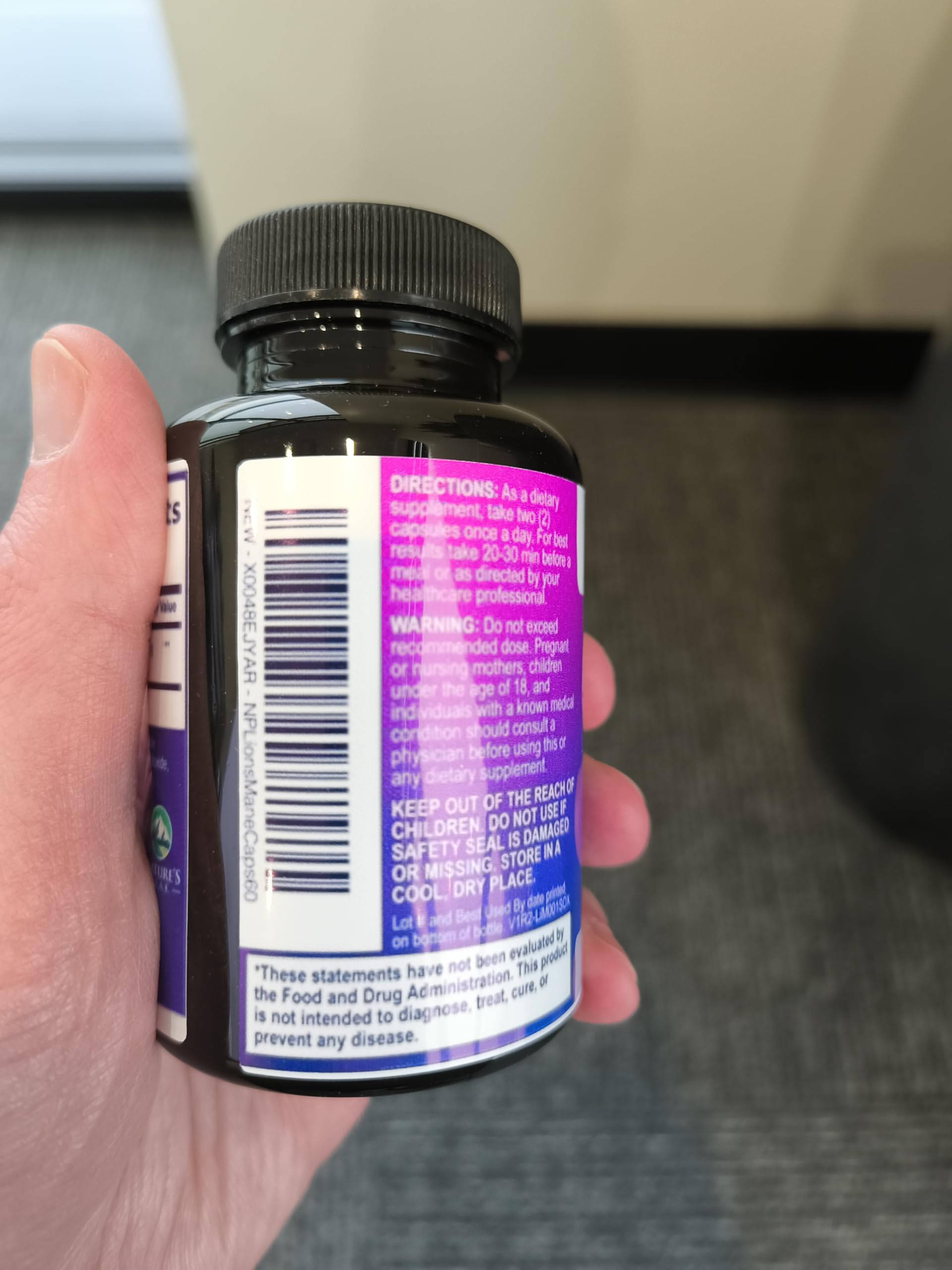 Nature's Peak Lion's Mane Mushroom Capsules 1000mg with capsules visible