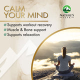 Nature's Peak Magnesium Glycinate 500mg supplement on a wooden table