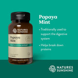 Nature's Sunshine Chewable Tablets on a wooden table