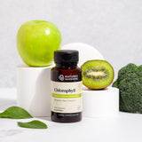 Nature's Sunshine Chlorophyll Capsules 50g lifestyle scene on a kitchen counter