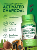 Nature's Truth Activated Charcoal Capsules on a wooden surface