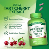 Nature's Truth Tart Cherry Extract Capsules on a wooden table