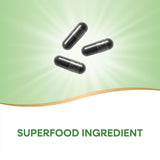 Nature's Way Chlorella 1230mg capsules on a wooden table