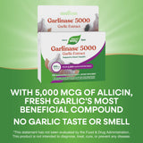 Nature's Way Garlinase 5000 supplement bottle on a wooden table