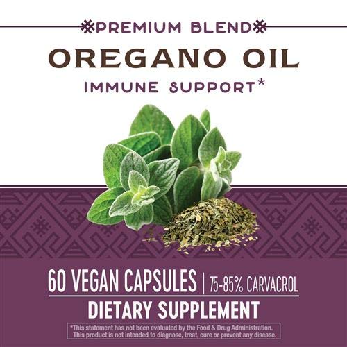 Nature's Way Oregano Oil Capsules on a wooden table