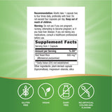 Nature's Way Red Yeast Rice 600 mg capsules on a wooden surface