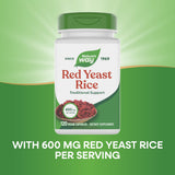 Nature's Way Red Yeast Rice 600 mg capsules with a measuring spoon