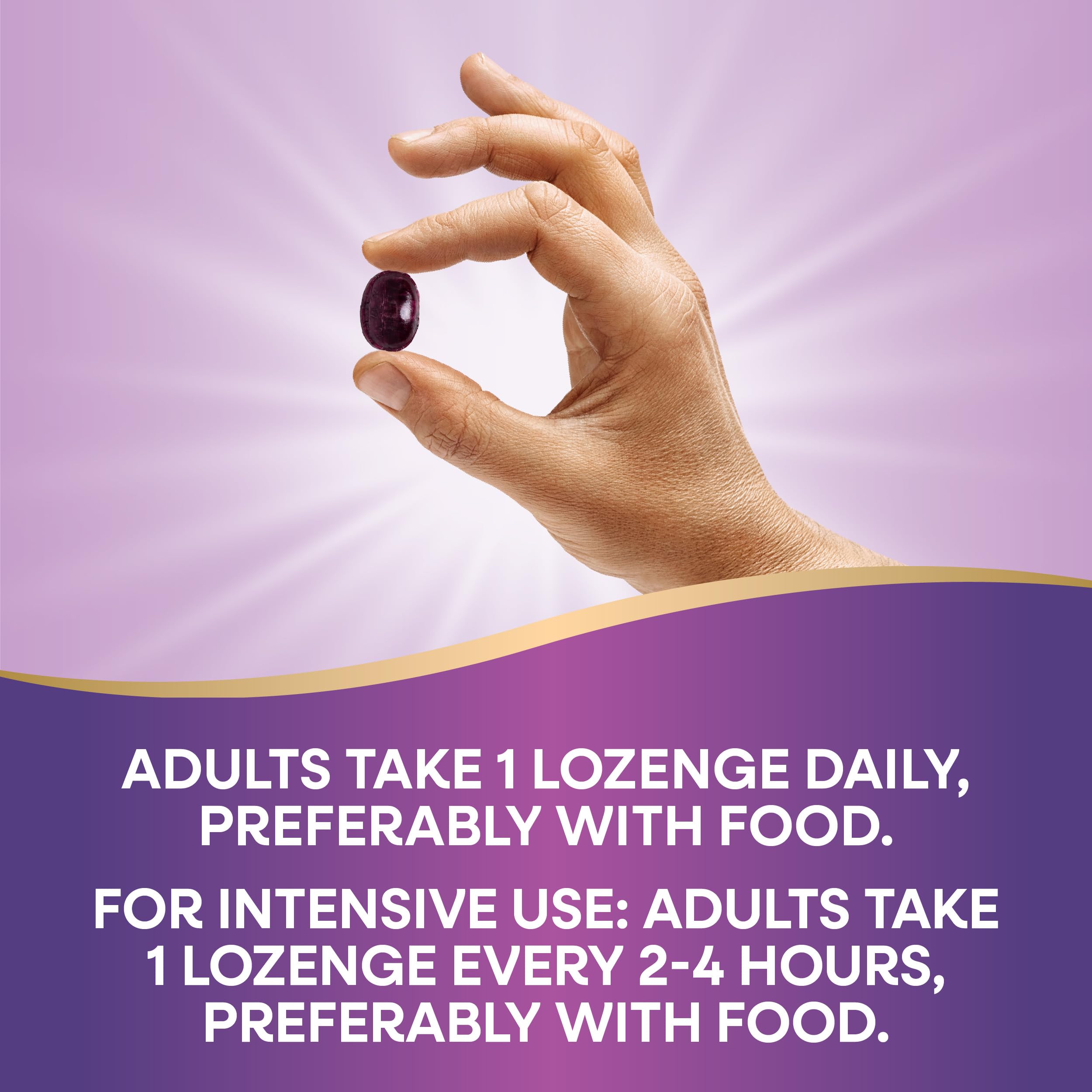 Nature's Way Sambucus daily wellness Lozenges in a hand, ready to use