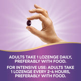 Nature's Way Sambucus daily wellness Lozenges in a hand, ready to use