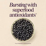 Nature's Way Sambucus Elderberry Gummies with a hand holding a gummy