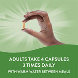 Nature's Way Slippery Elm Capsules on a wooden table